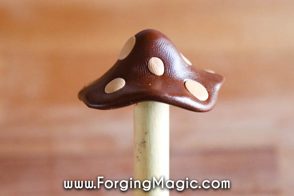 Attaching clay mushroom cap to stalk