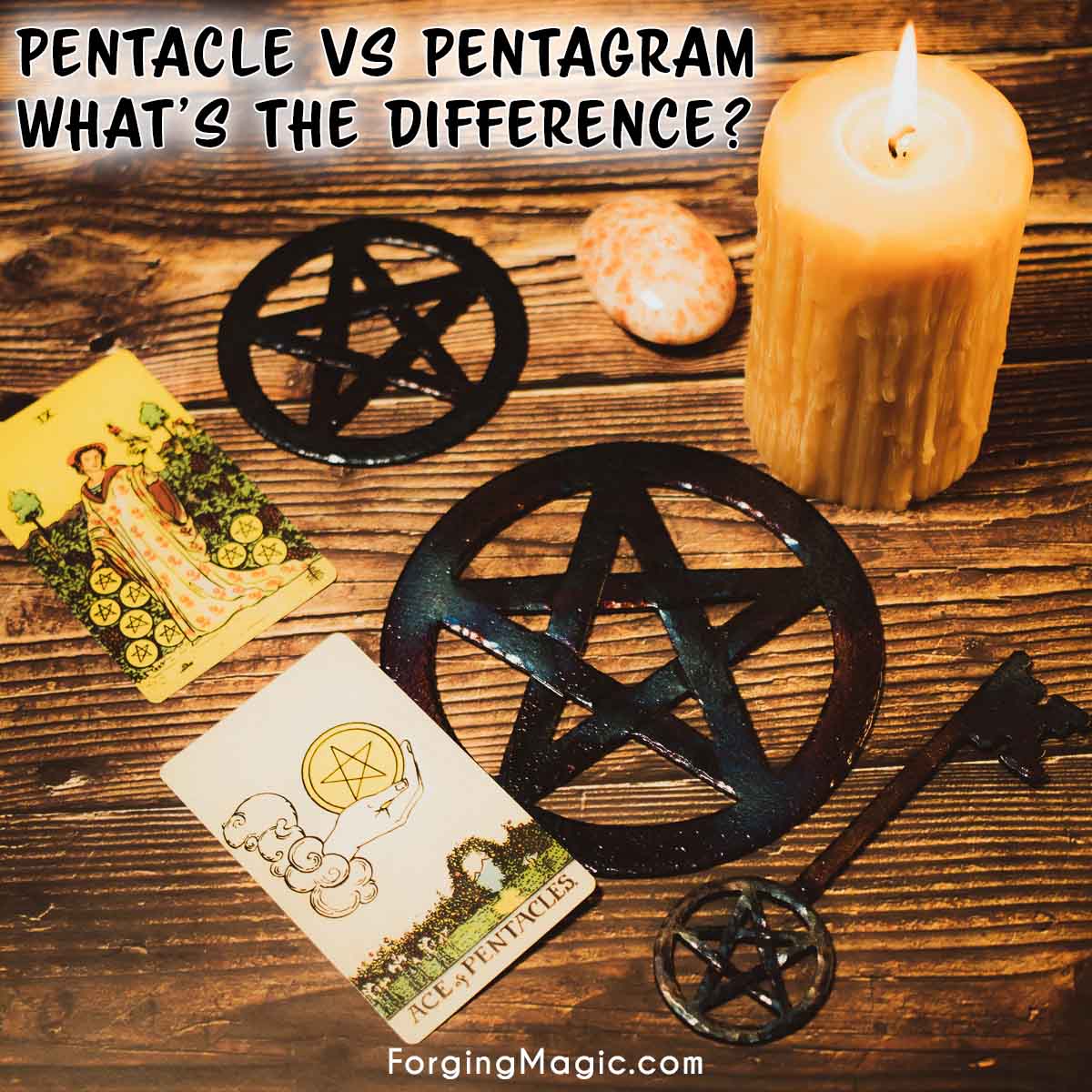 Iron pentacles and an iron pentacle key with pentacle tarot cards and a candle. Text says Pentacle vs Pentagram, what's the difference.